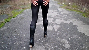 Legs And Heels In Nylon Leggings And Boots