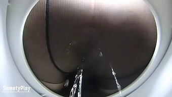 Close-Up Of Mature Woman Peeing In Shower With Pantyhose On