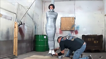 Curvy Woman Restrained With Duct Tape And Toy Play