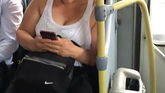 Mature Woman'S Breasts Bounce On Public Transportation