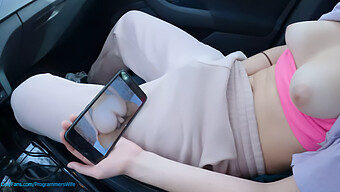 Young Woman Pleasures Herself In A Public Parking Lot While Viewing Her Adult Film - Featuring Large Natural Breasts, Amateur Footage, And A Satisfying Climax.