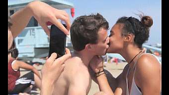 A Seductive African American Woman Engages In Kissing With Caucasian Men On The Shore!